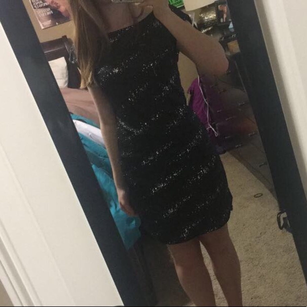 Beautiful sparkly formal dress with a crossed back